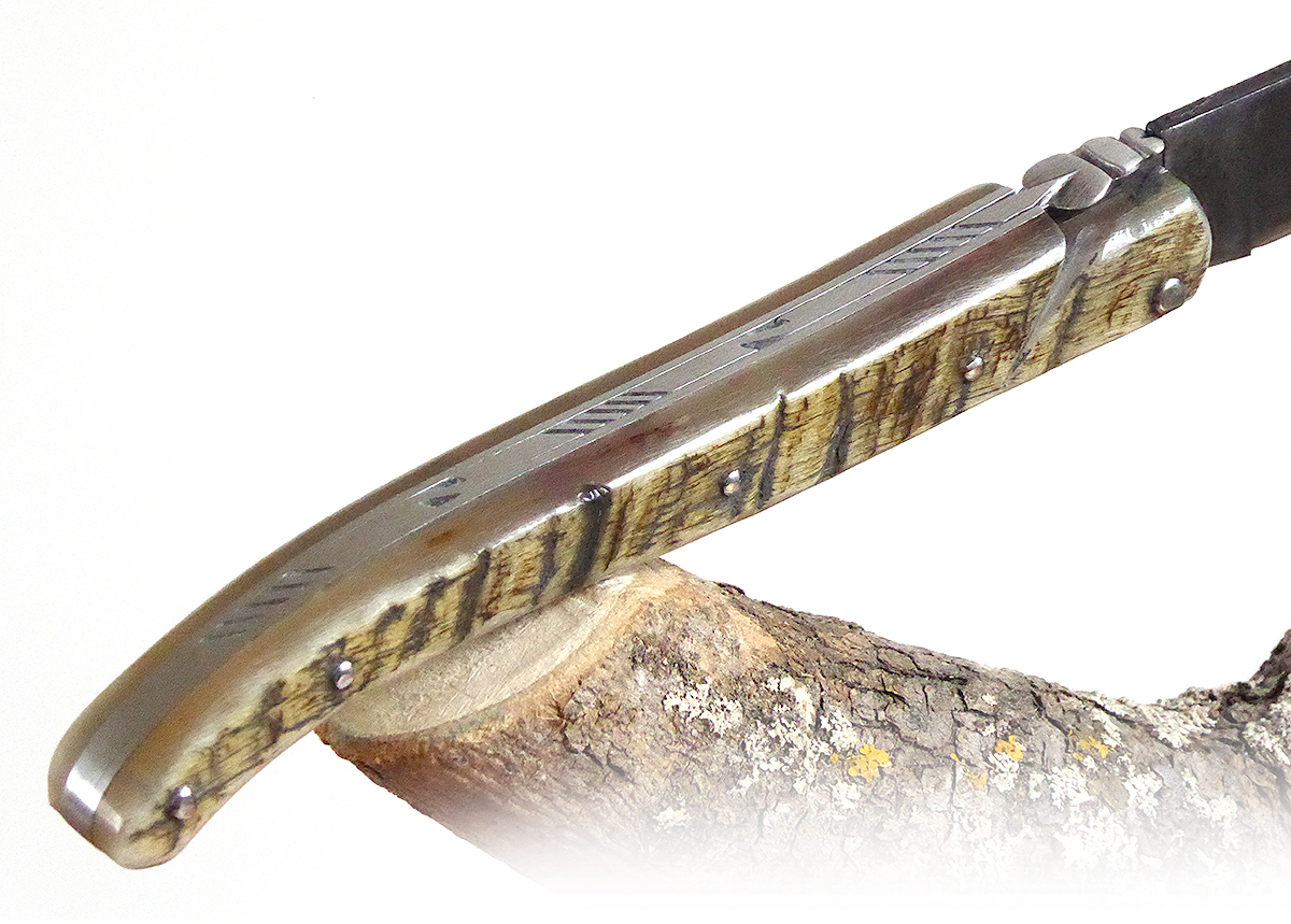 Laguiole Forged, with its Natural Ram's Horn Full Handle. GUILLOCHE Pattern  #1